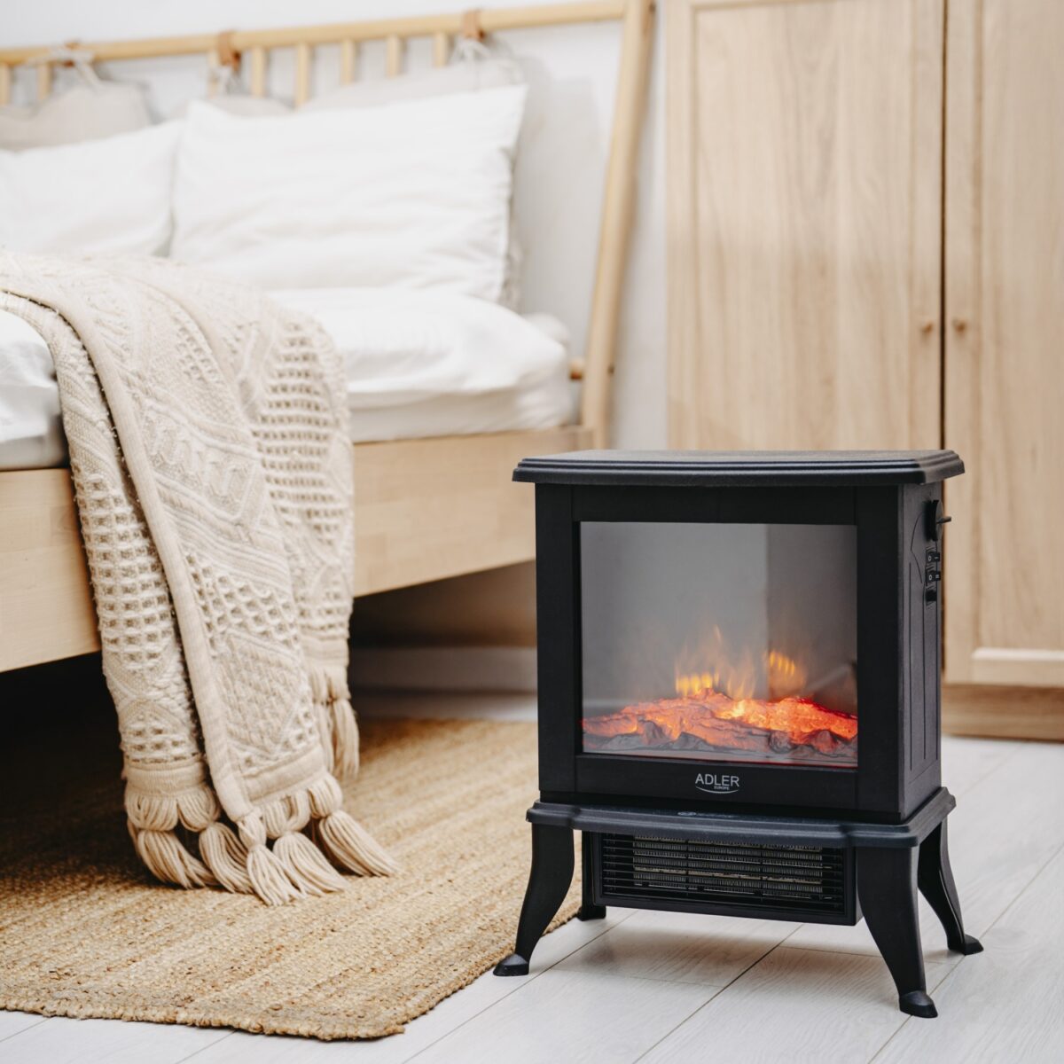 Електричний камін Adler AD 7754: Затишок та тепло з 3D-ефектом полум’я